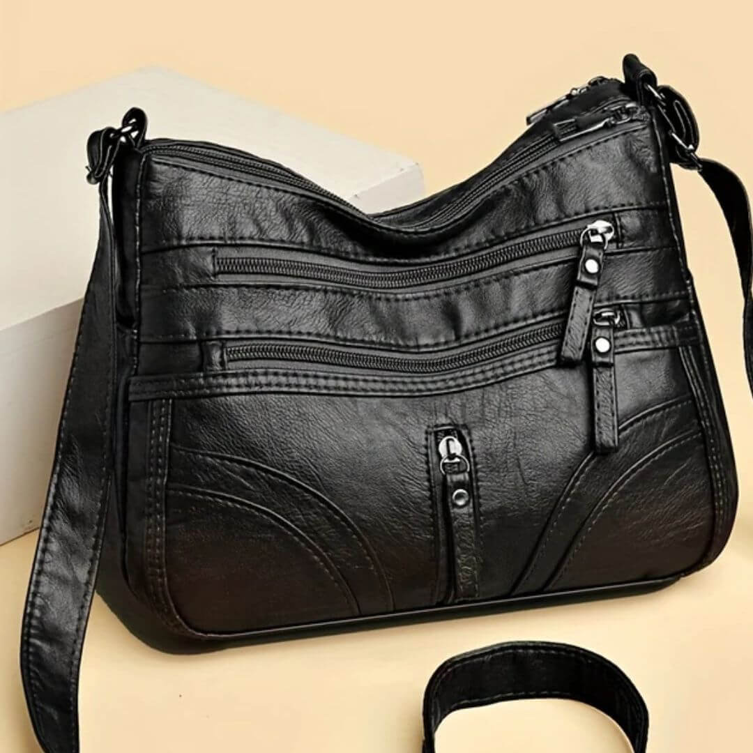 Cheryl’s Sleek Zip Companion | Crossbody Bag